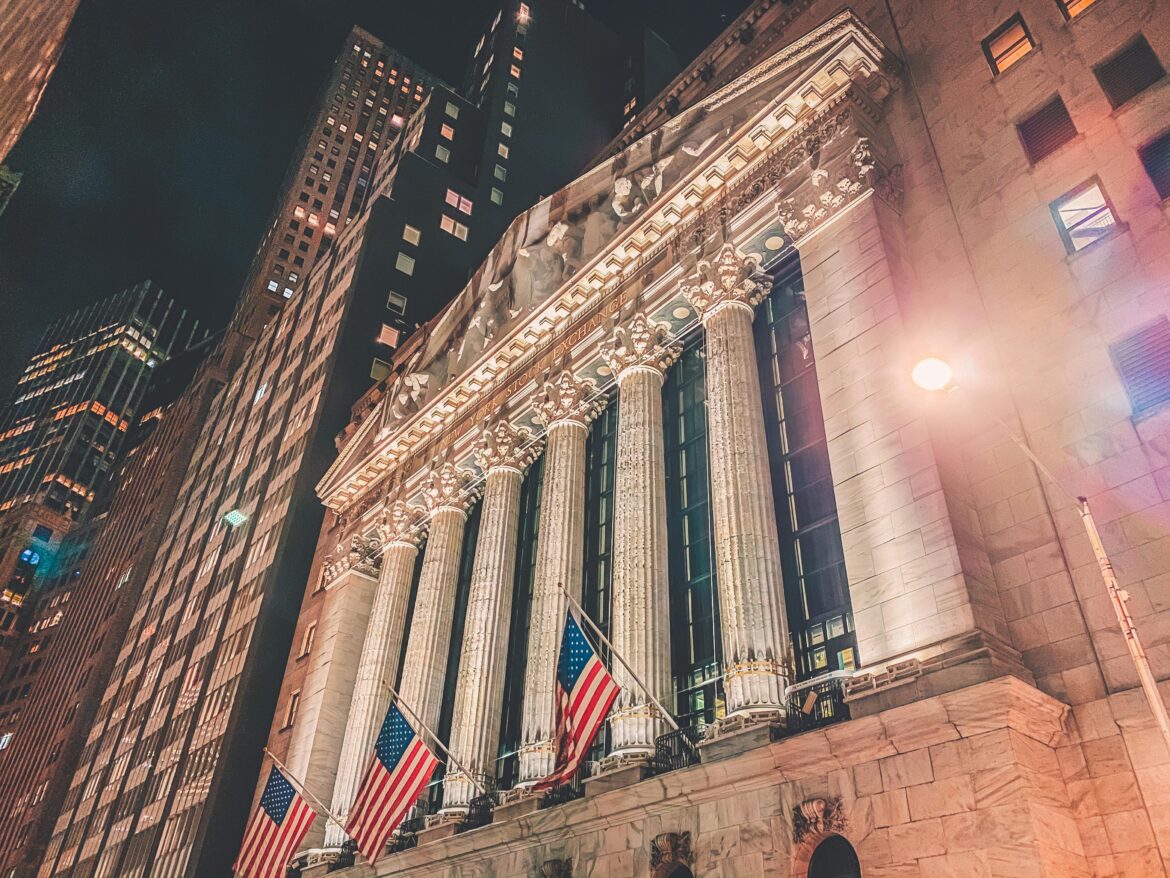 New york stock exchange building manhattan united states during nighttime