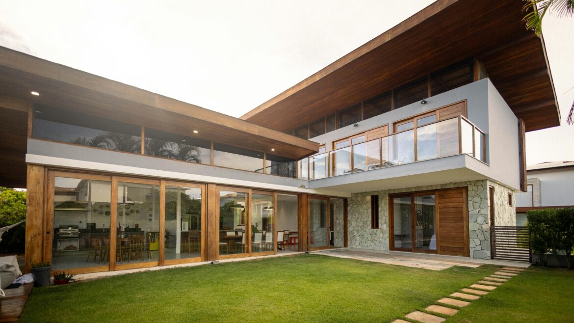 Modern luxury house with glass windows and wooden finish