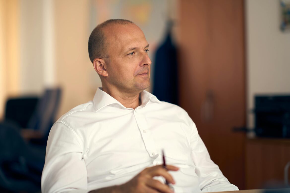 Professional portrait of a thoughtful businessman