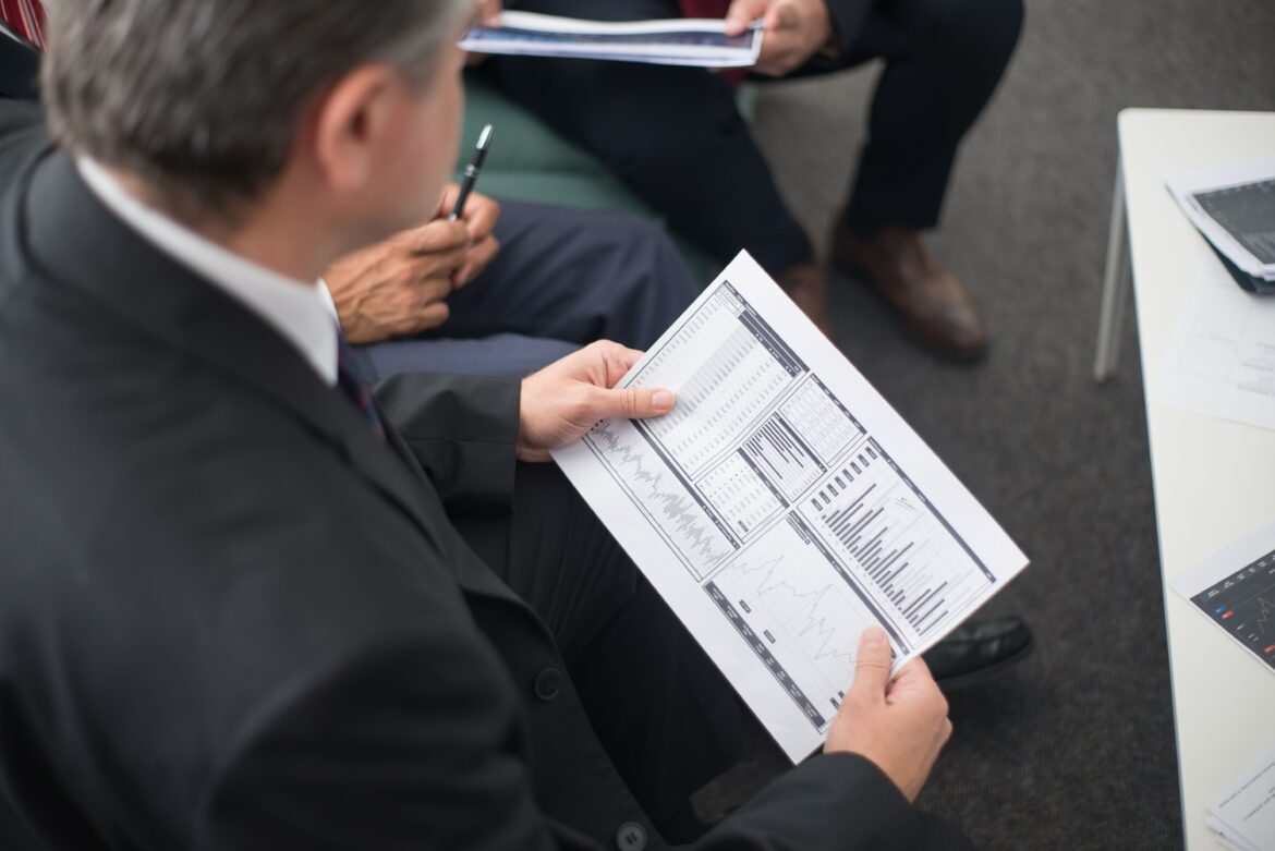 Man holding a document