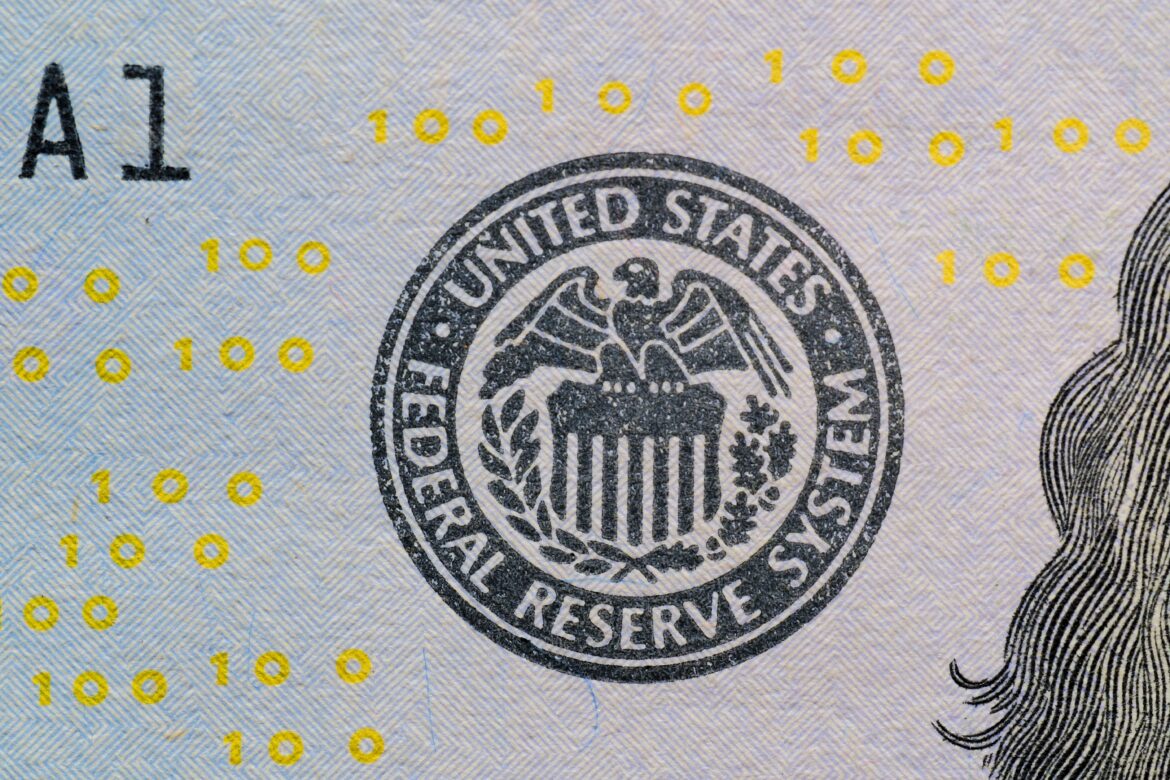 Close up of us federal reserve symbol on currency