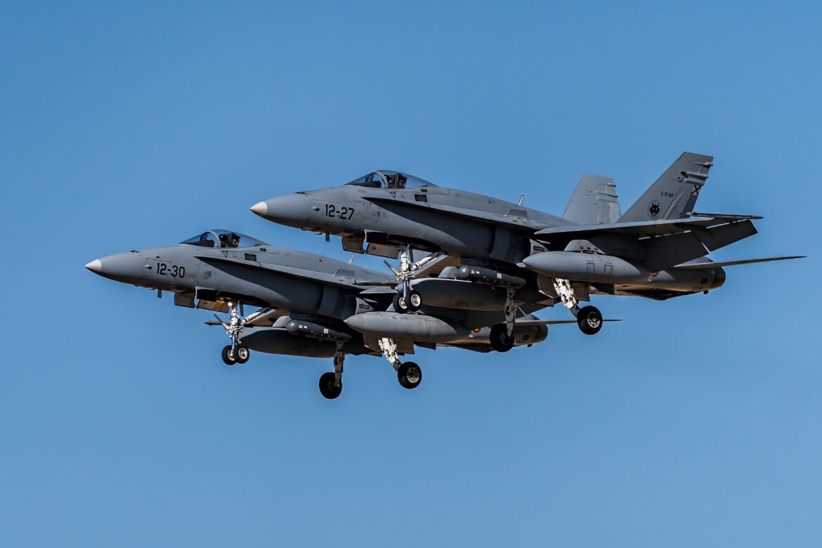 Spanish airforce jets in flight over blue sky