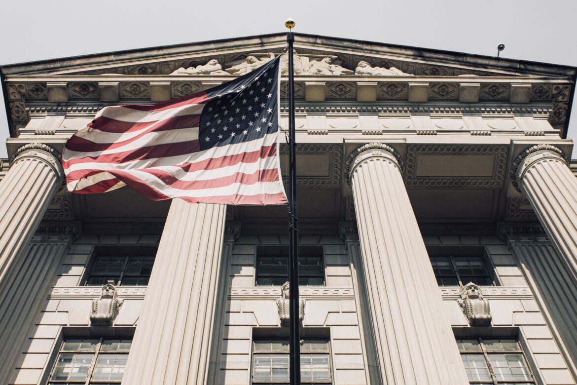 Usa flag flying in front of government building