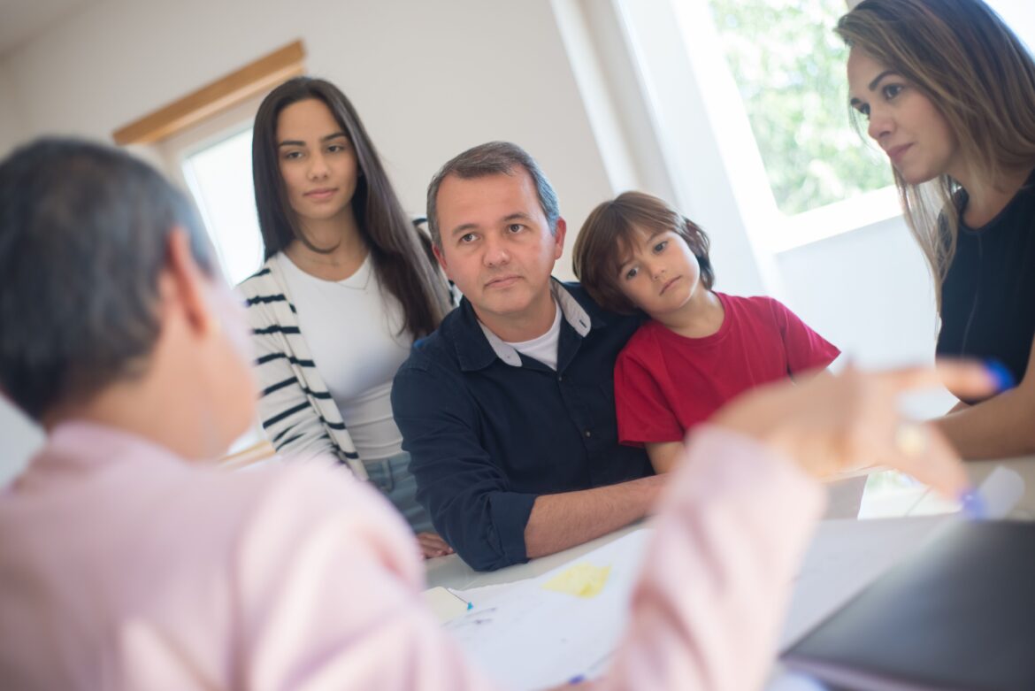 A family sitting at the table