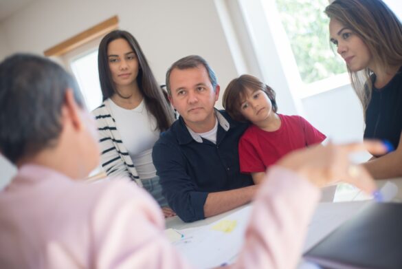 A family sitting at the table