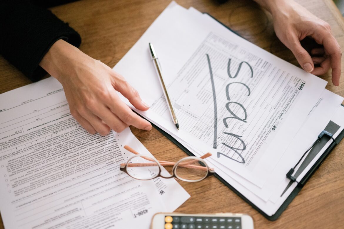 Close up shot of a person holding documents