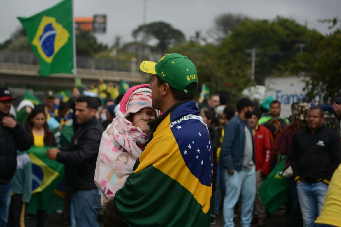 Gathering of people with flags of brazil
