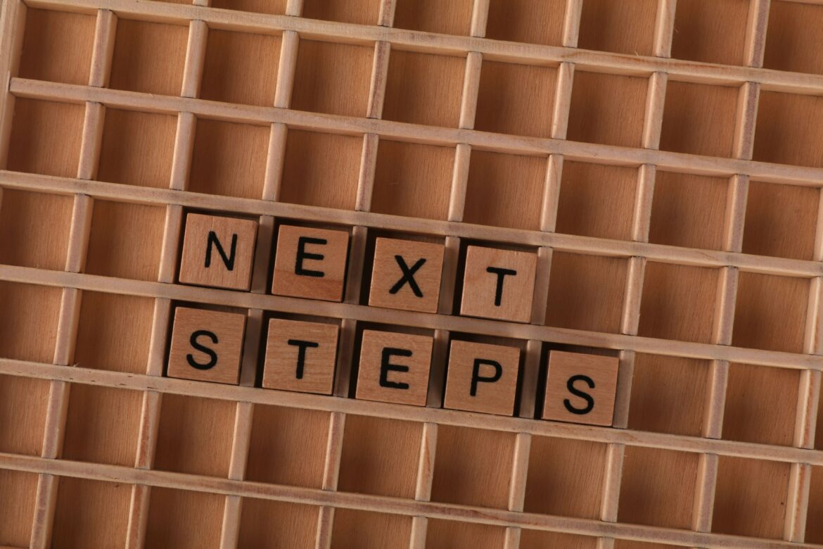 Motivational concept with wooden letter blocks
