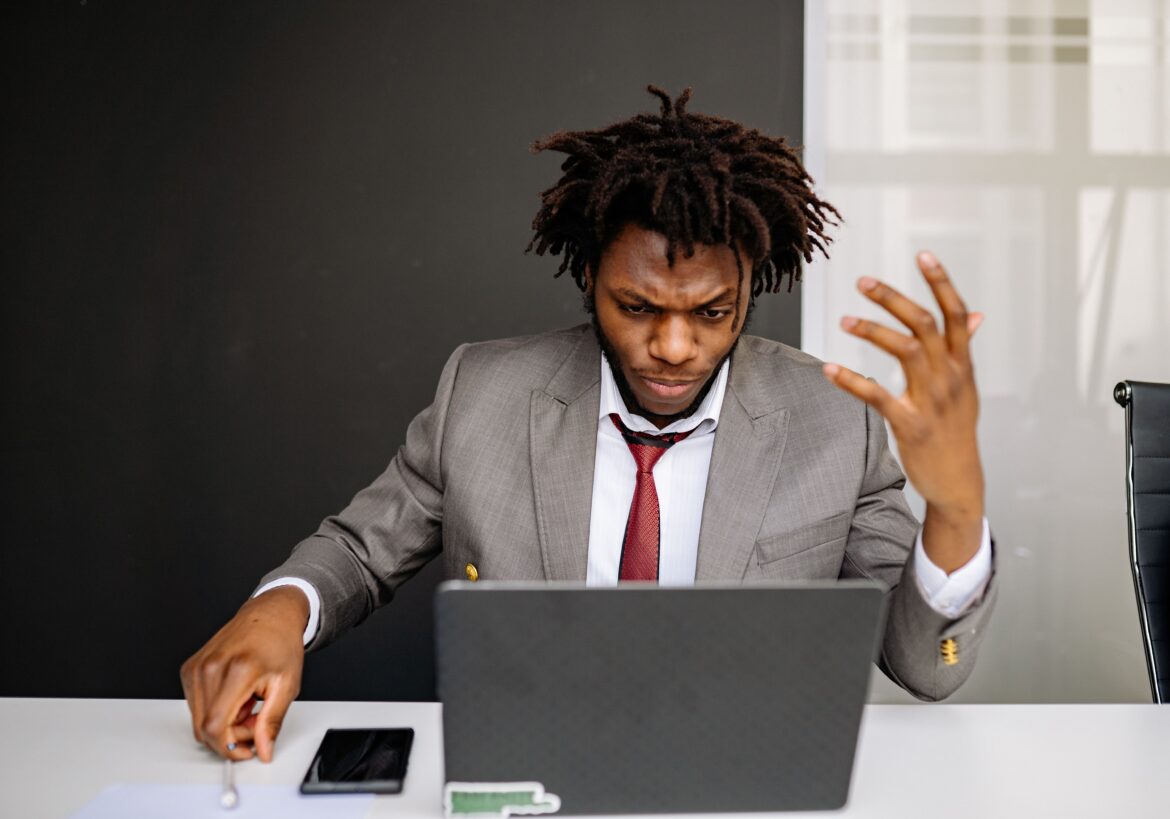 A businessman with a serious facial expression while working