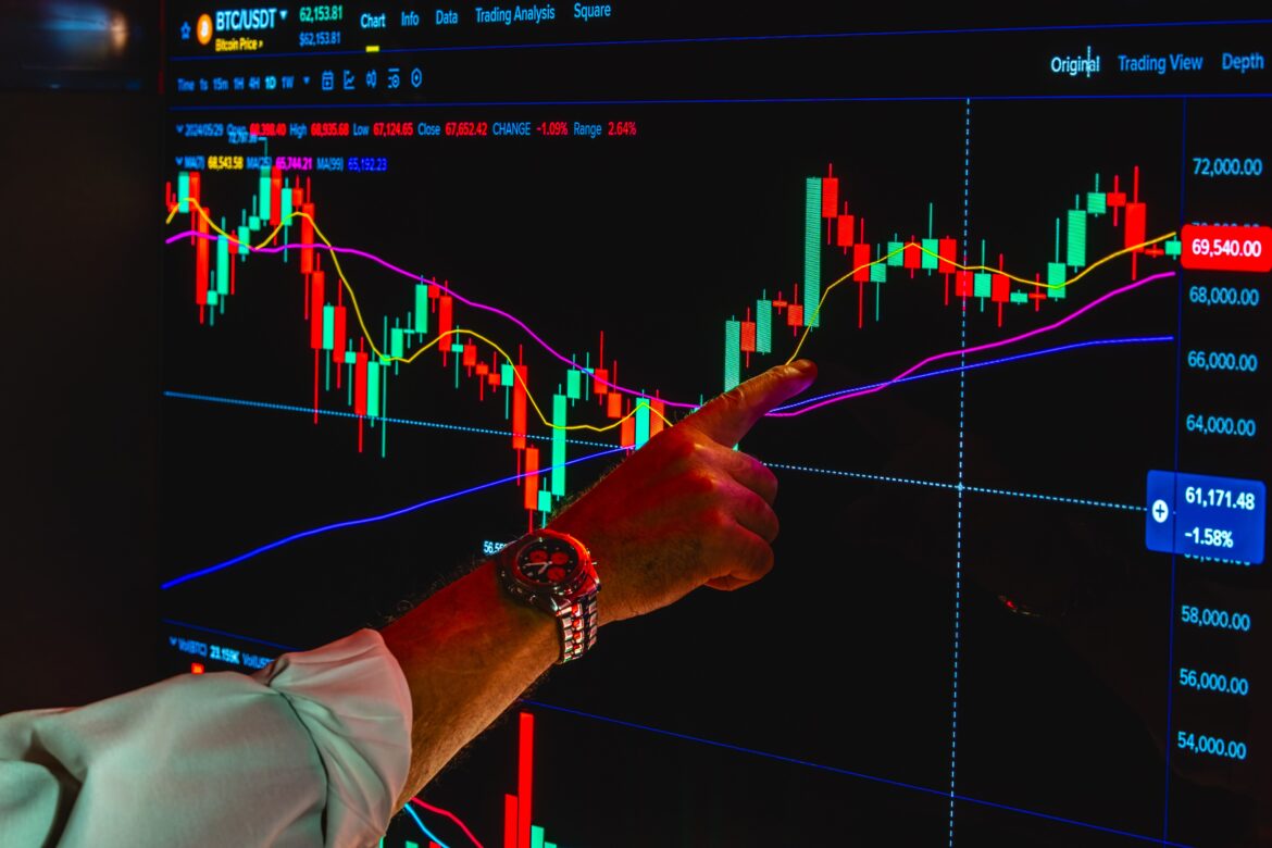 Analyzing cryptocurrency market trends displayed on screen