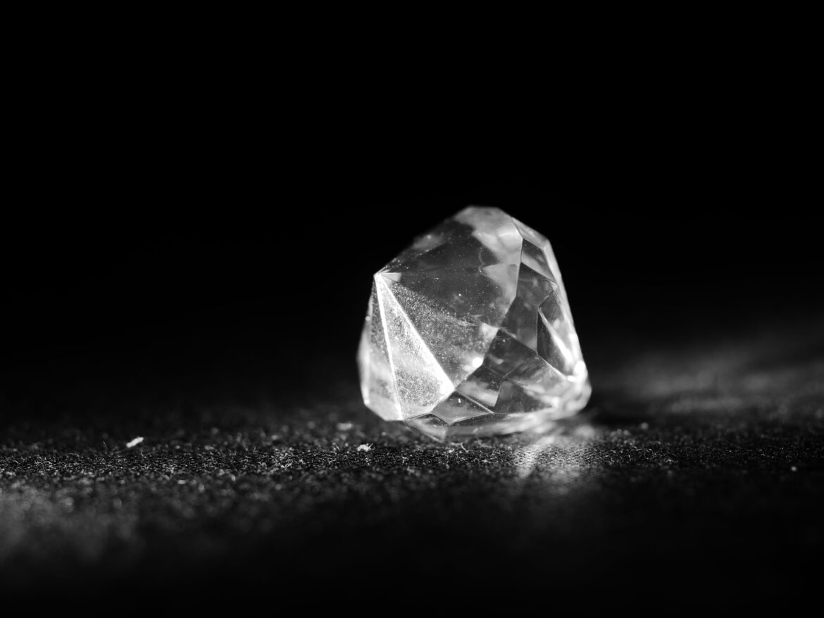 Clear crystal on black and white surface