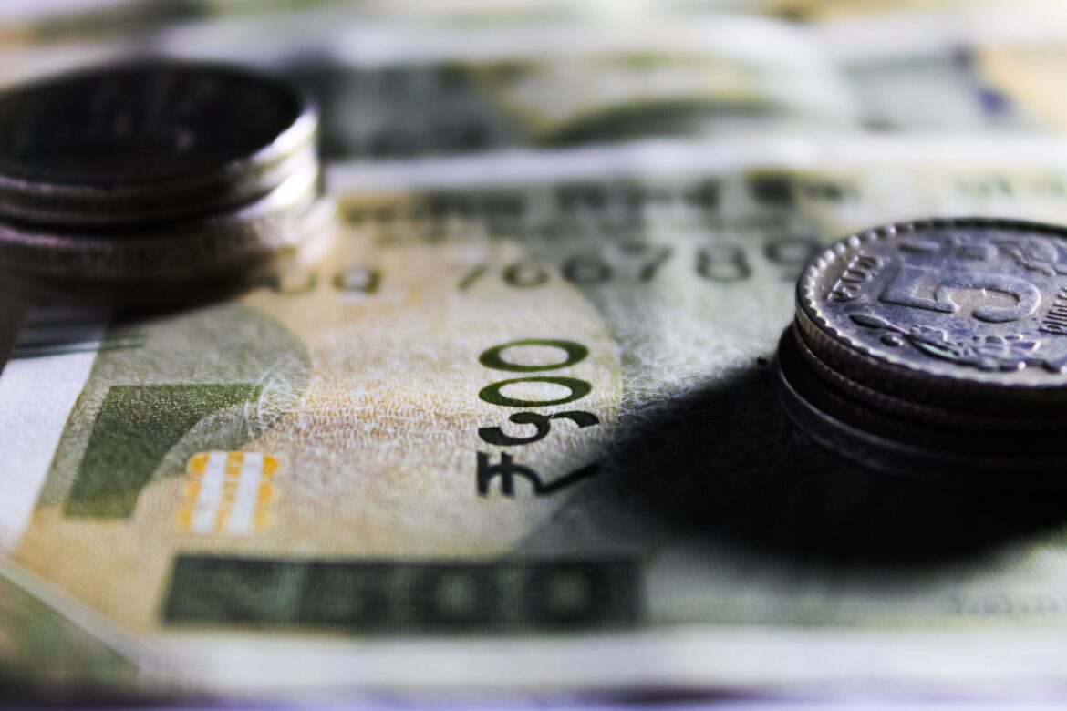 Close up photo of paper bills and coins