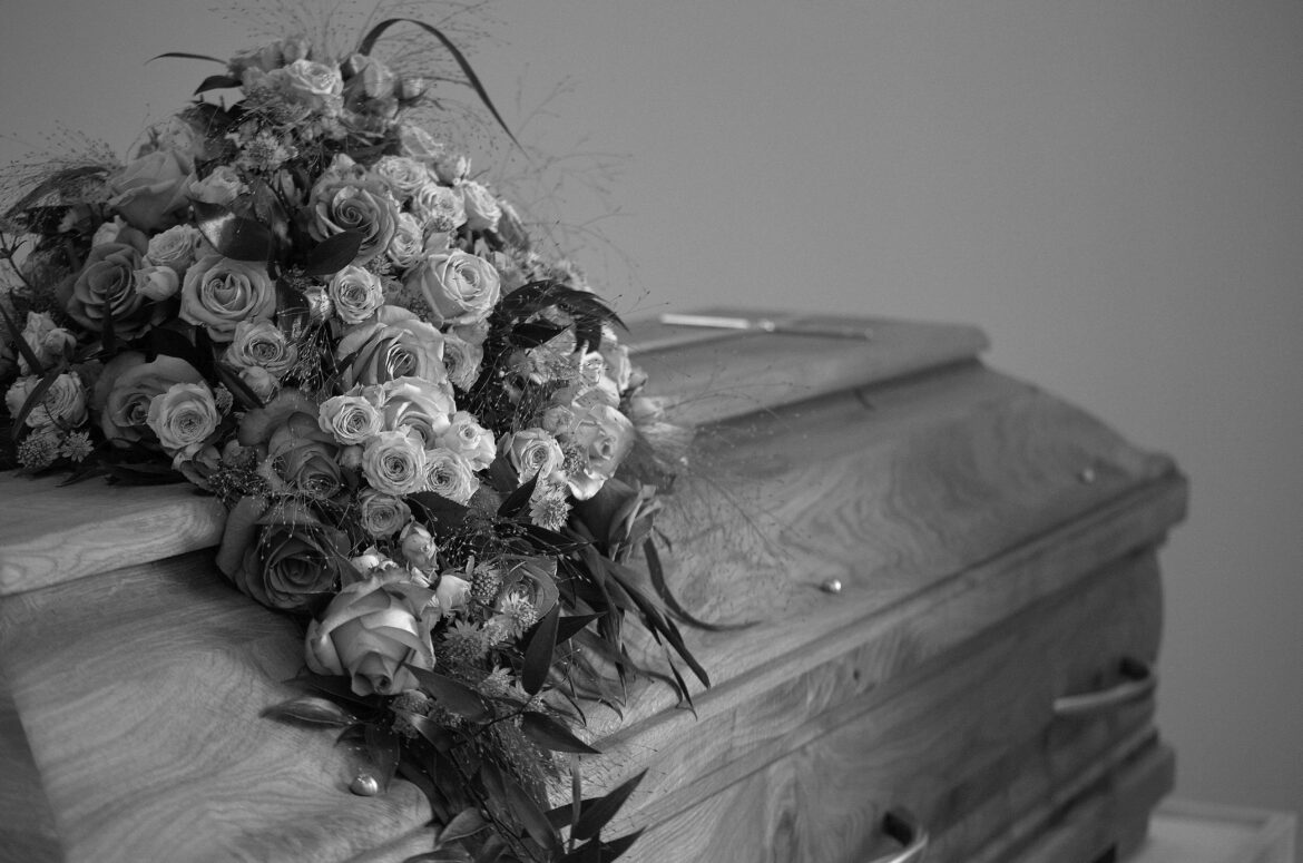 Flowers decoration on wooden casket