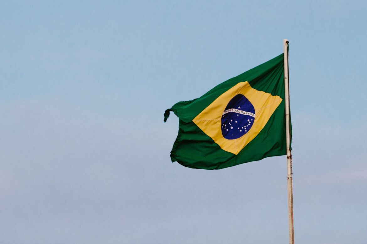Photo of a brazilian flag in the wind
