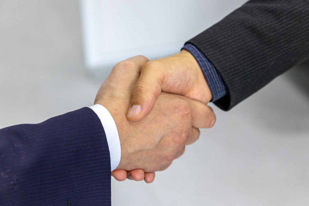 Professional handshake in business meeting