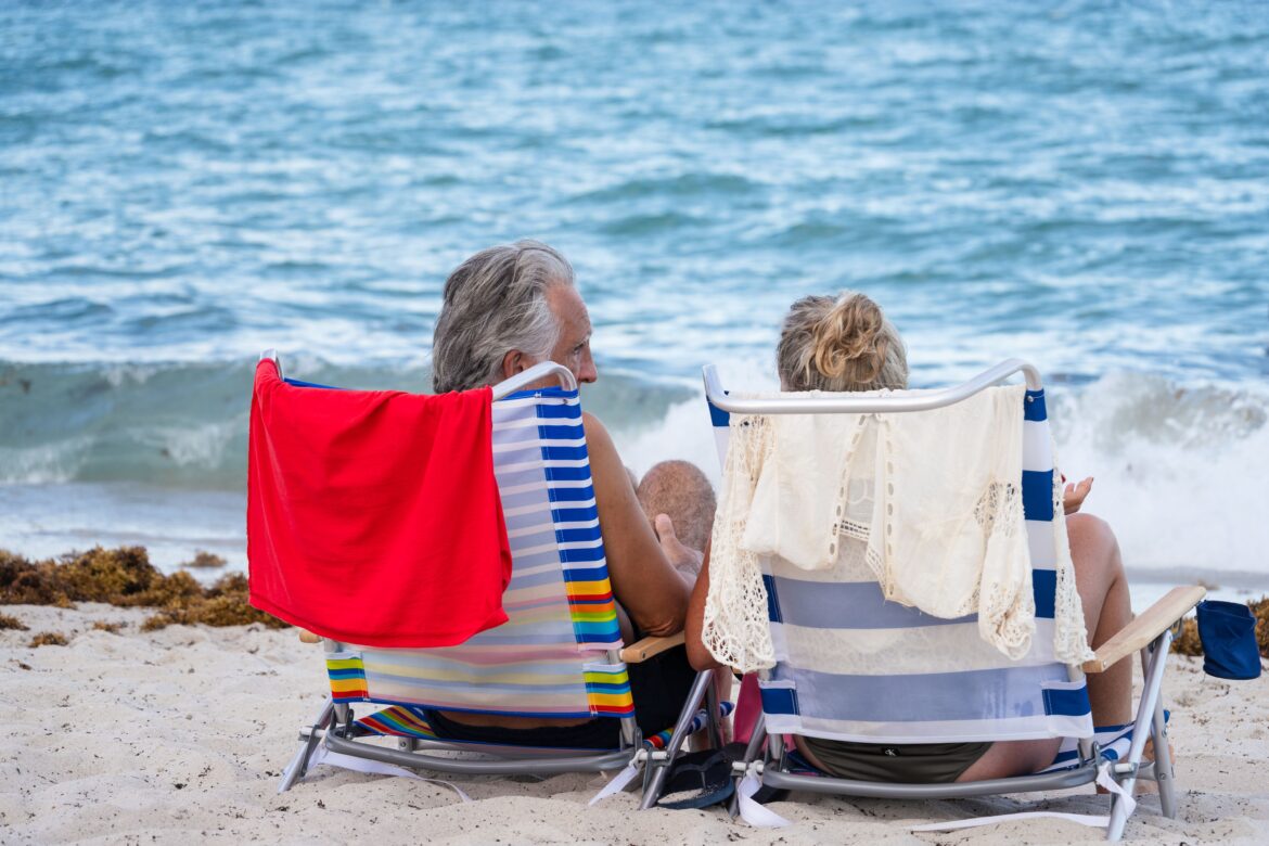 Relaxed senior couple enjoying miami beach